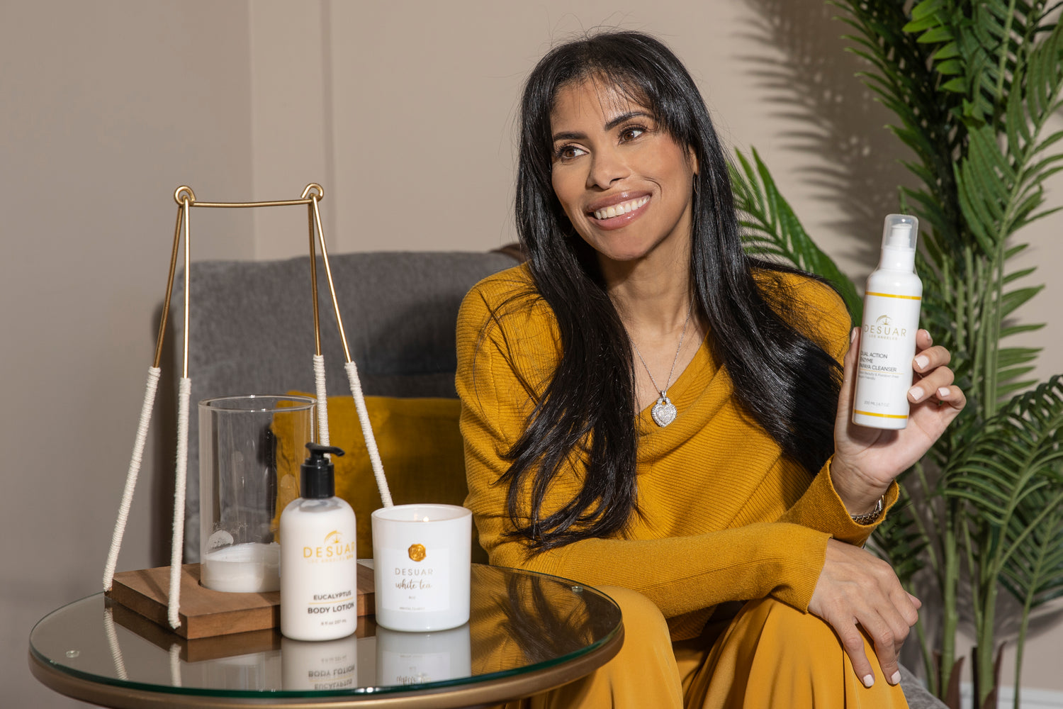 DESUAR Spa founder Deisy Suarez with a few of her products