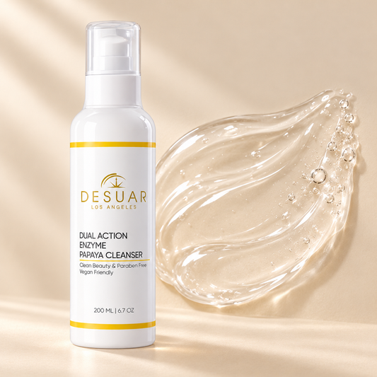 Dual Action Enzyme Papaya Cleanser bottle beside its cleanser texture on warm beige